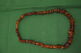 A good graduated amber bead necklace.
