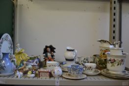 Shelf of decorative china.