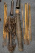 Early African arrows and leather quivers.