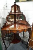 A late Victorian mahogany corner display unit.