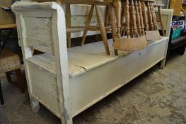 A large, possibly Scandinavian, painted settle.