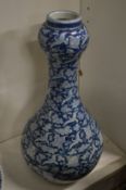A large Chinese blue and white garlic neck vase.