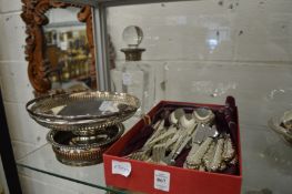 A glass decanter with silver collar, plated basket, wine coaster and quantity of plated flatware.