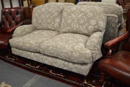 A good modern two seater settee with feather filled cushions.