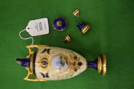 A Coalport pedestal vase (faults).