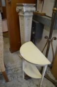 A plaster column (af) and a small painted table.