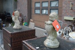 A pair of reconstituted stone gate post finials modelled as lions rampant.
