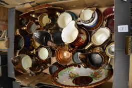 Lustre decorated jugs and other items.