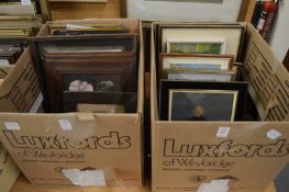 Two boxes of assorted paintings and prints.
