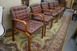 A good set of six Swedish leather and teak framed armchairs by Kinnarps.