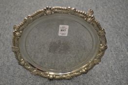A good pair of Georgian circular silver salvers with shell cast and gadroon borders borders and