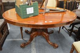 A Victorian mahogany oval tilt-top breakfast table.
