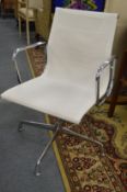 An Eames EA107/108 office swivel armchair (later addition).