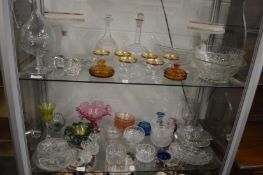A good collection of coloured and cut glassware to include bowls, dishes, decanters etc.