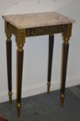 A small marble top table.