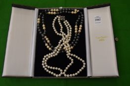 Two pearl necklaces.