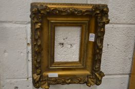A gilt frame.
