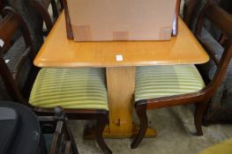 An Ercol dining table.