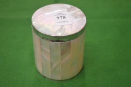 A mother of pearl box.