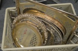 A large silver plated twin handled tray and various other trays and dishes.