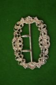 A Victorian silver nurses buckle.