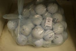 A bag of golf balls.
