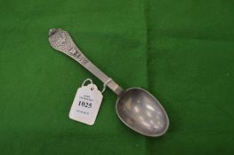 A pewter spoon.
