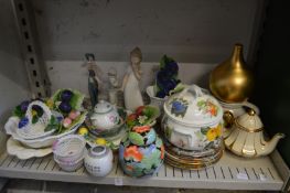 A shelf of decorative china to include a pair of Herend basket weave dishes.