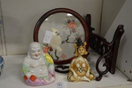 Porcelain Buddha, a Thai nodding head figure and a small Chinese screen.