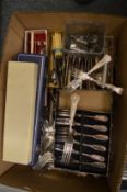 A large quantity of plated flatware, some boxed.