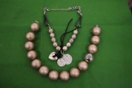 Decorative bead necklaces.