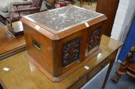 A good Victorian carved walnut four drawer table canteen.