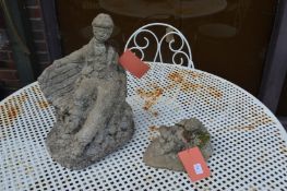 Two reconstituted stone garden ornaments.