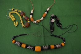 A quantity of decorative bead necklaces.