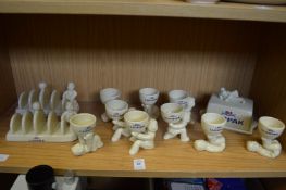 A collection of Lurpak pottery items to include egg cups, toast racks and butter dish complete