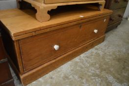 A pine storage chest.