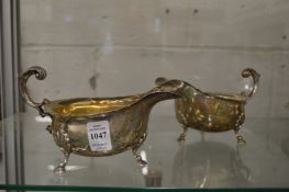 A good pair of large silver sauce boats on hoof feet.
