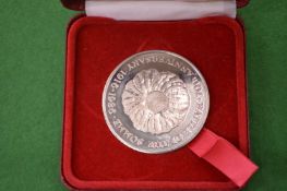 A Commemorative medal.