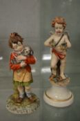 Two Capodimonte figures.