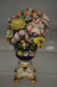 A Derby flower encrusted urn.