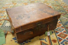 A leather shotgun cartridge case.