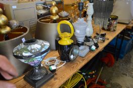 An Art Nouveau style table lamp and four other lamps.