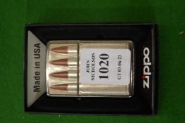 A boxed Zippo lighter.