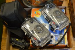 Various camera equipment with waterproof covers etc.