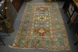 A Kilim style carpet, some wear and damage, 205cm x 135cm.