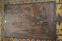 An Egyptian engraved and painted metal picture.