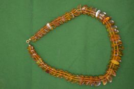 A good graduated amber bead necklace.