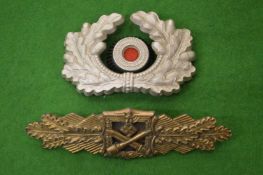 A German military badge and another item.