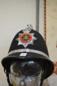 A South Wales police helmet.