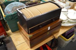 A writing slope and storage box.